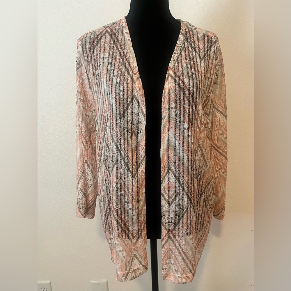 Peach, lacy sheer shell
